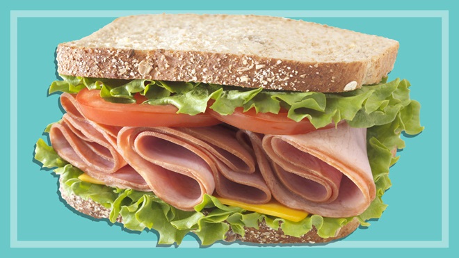 sliced ham on a gourmet sandwich